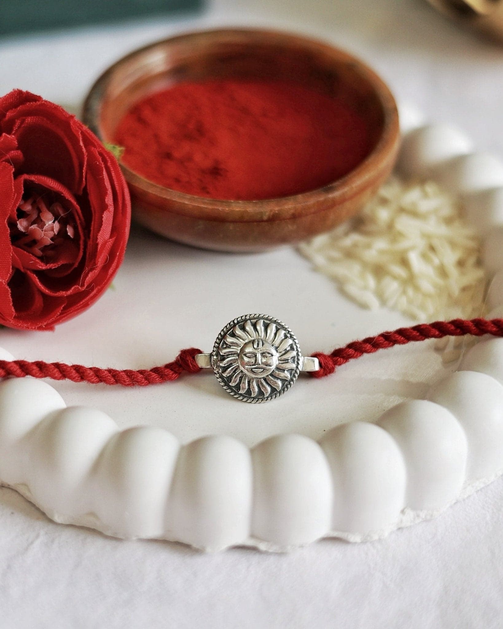 Surya Watch Charm Rakhi