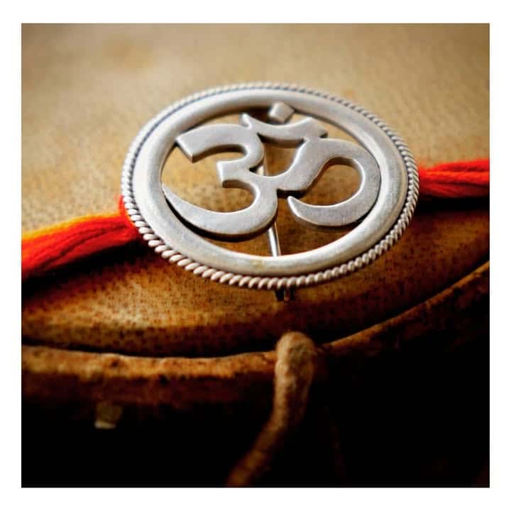 Om Rakhi cum Brooch