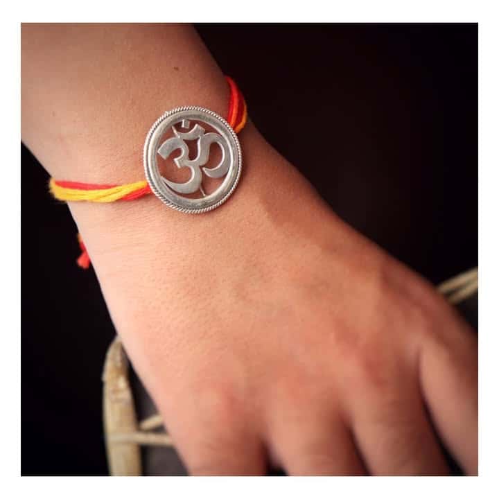 Om Rakhi cum Brooch