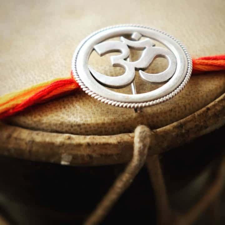Om Rakhi cum Brooch