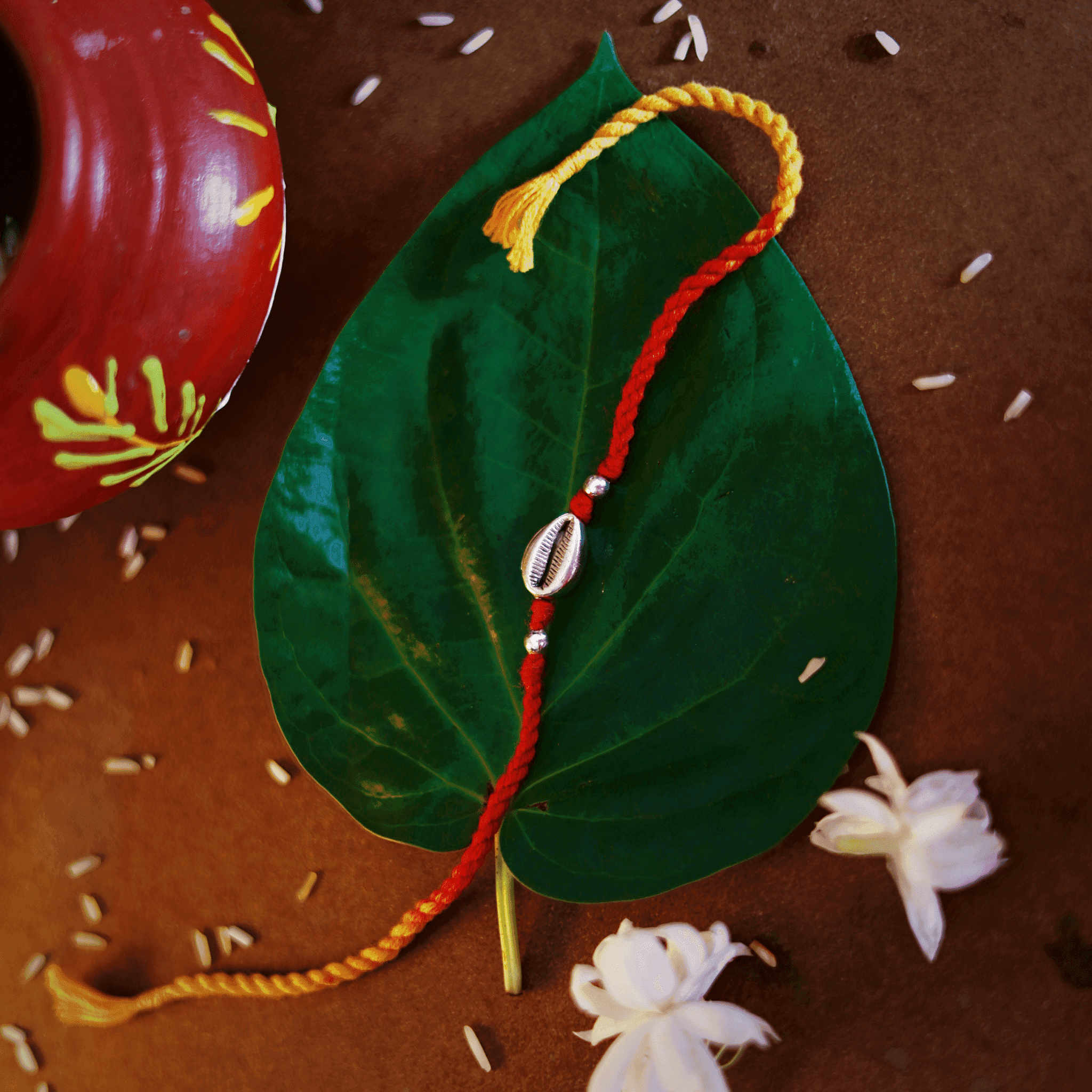 Silver Cowrie Rakhi